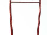 a wooden stand with a coat rack on top of it