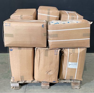 many boxes stacked on a pallet in a warehouse
