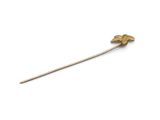 an image of a gold stick with a flower on it