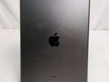 an apple ipad is sitting on a table with a white background