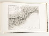an open book with a map of the mountains and rivers in it