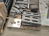 a lot of metal items on a pallet in a warehouse