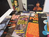a lot of books that are on a table