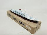 a close up of a box with a toy ship on it