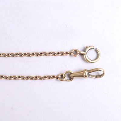 pair of gold plated chain with clasps on white background
