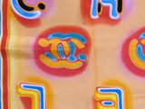 a picture of a scarf with the letters c and e on it