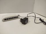 a white route board with a power cord plugged into it
