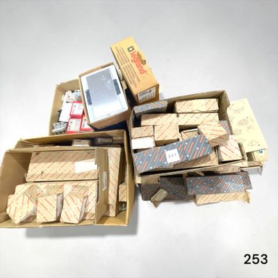 several boxes of electronic devices are stacked on top of each other