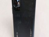 the back of a black phone with a camera attached to it