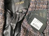 a close up of a jacket with a label on it
