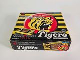 a box of tiger ' s cigarettes sitting on a table