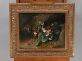 an oil painting of flowers in a wooden box on a table