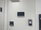 a picture of a wall with a bunch of electronic devices on it