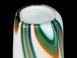 a glass vase that is sitting on a table