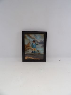 une photo d'un tableau représentant un garçon et un chien posés sur une table