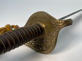 a sword that is sitting on a table