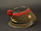 a military hat with a chain around the band