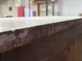 a close up of a wooden counter top in a room