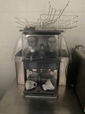 a machine that is sitting on a counter in a kitchen