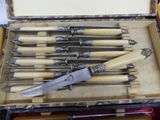 many knives in a case on the table