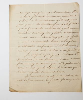 a letter written in cursive handwriting on a piece of paper