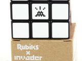 a rubik cube that is sitting on top of a cardboard box