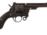 gros plan d'un revolver sur fond blanc