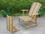 a chair and a table that are sitting on the ground