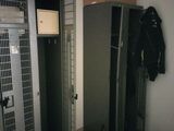an image of a locker in a room with a coat rack