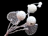 a close up of a bunch of beads on a string