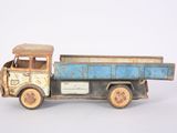 a toy truck that is sitting on a white surface