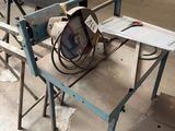 an image of a work bench with a sawhorse in a warehouse