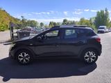 a picture of a black car parked on the side of the road