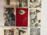 an assortment of old postcards are displayed on a white surface