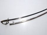 a close up of two swords on a white surface