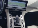 a picture of a car dashboard with a gps device in it