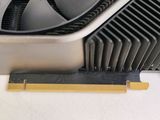 a close up of a video card with a fan on it
