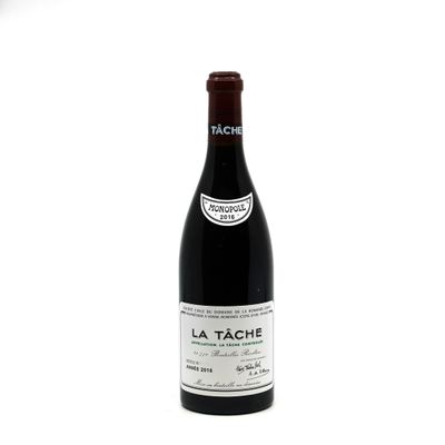 a bottle of wine that is sitting on a table