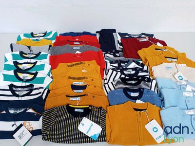 a lot of clothes that are on a table