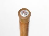 a wooden stick with a diamond on top of it