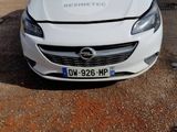 a picture of a white car parked in a parking lot