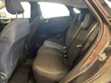 the back seats of a car with a seat belt in the back of it