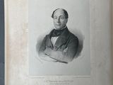 an old black and white photo of a man in a suit and tie