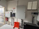 a room with a lot of electrical equipment in it