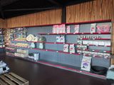a store with many items on the shelves in the store