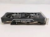 a close up of a video card on a white surface