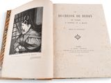 a book with a picture of a woman in a dress