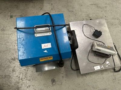 an image of a machine that is sitting on the ground