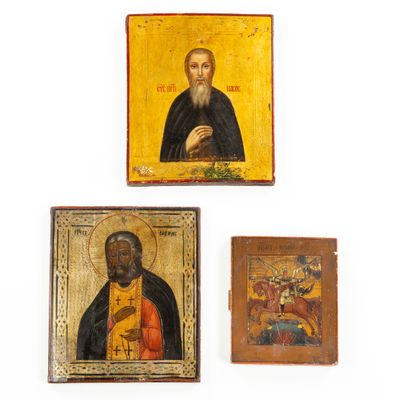 trois tableaux religieux représentant des saints sur fond blanc