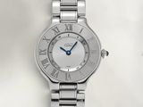 a close up of a wrist watch with roman numerals on it